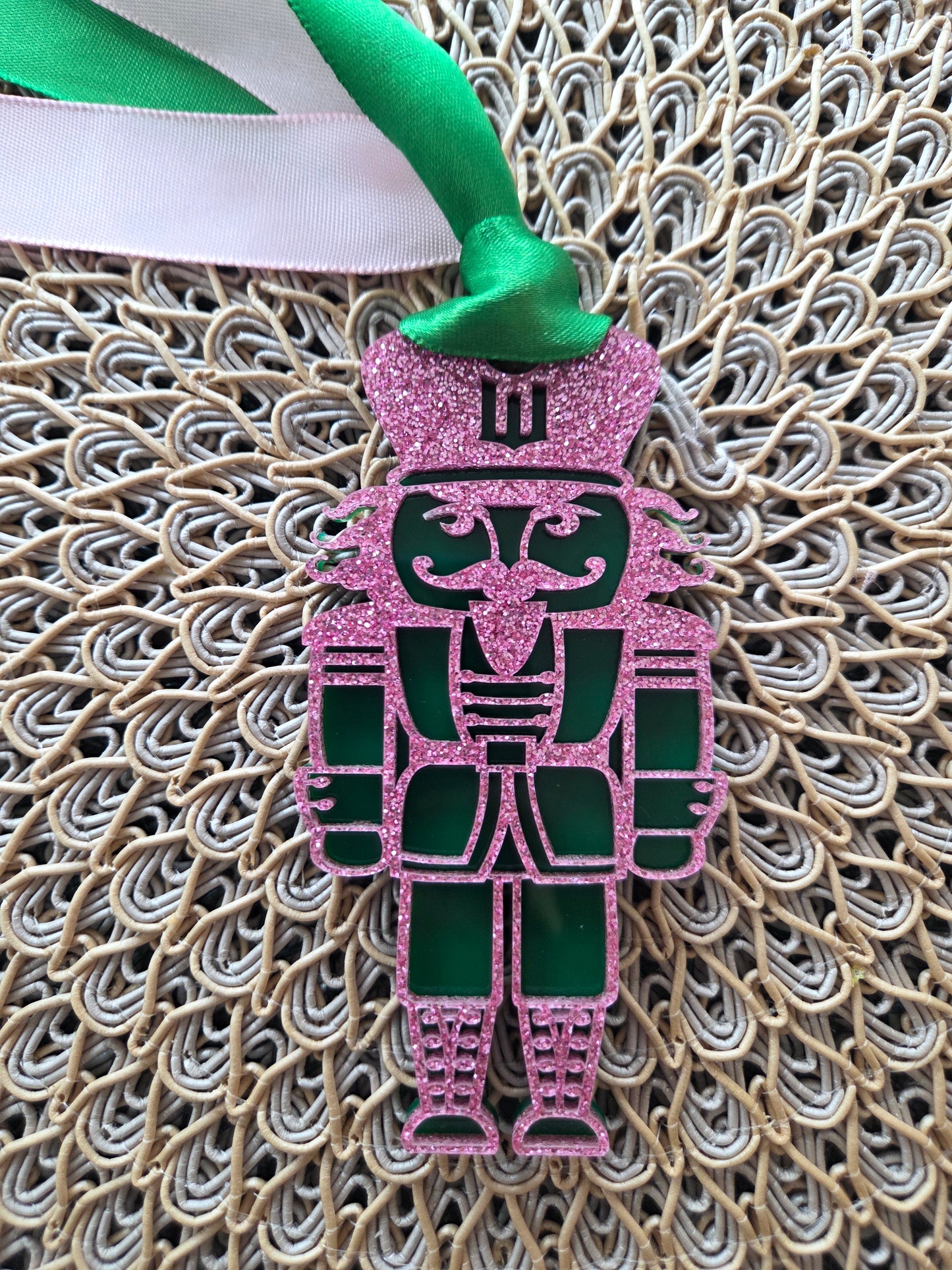 “Pink glitter and green acrylic nutcracker ornament inspired by Wicked witches”