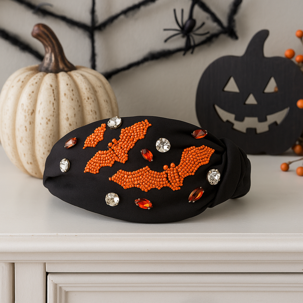 Beaded bat headband styled with festive Halloween décor