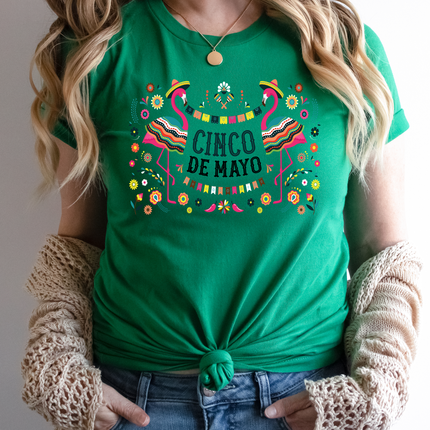 Close-up of flamingo graphic on colorful Cinco de Mayo shirt