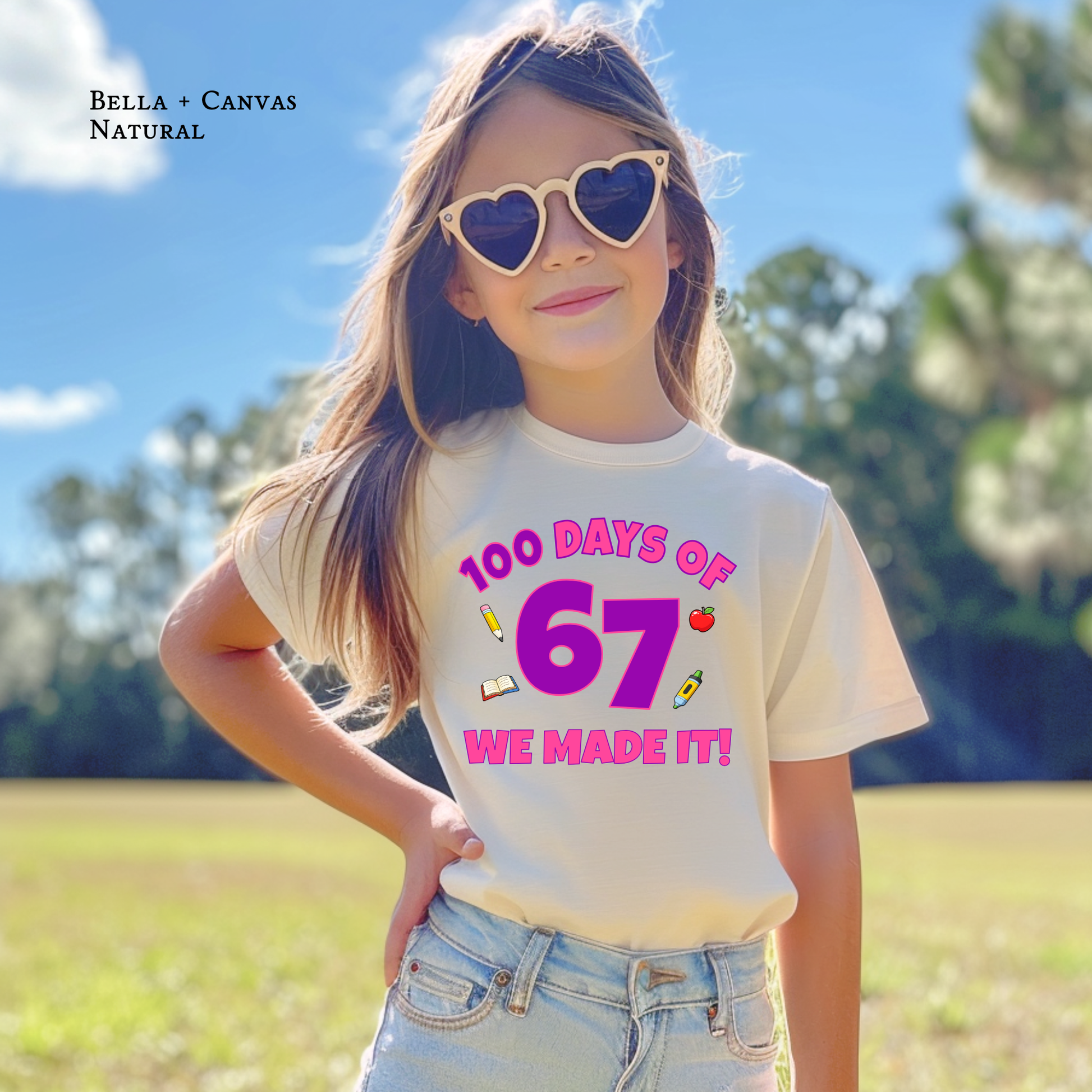 Child wearing a t-shirt with '100 Days of 67 We Made It!' text in a field.