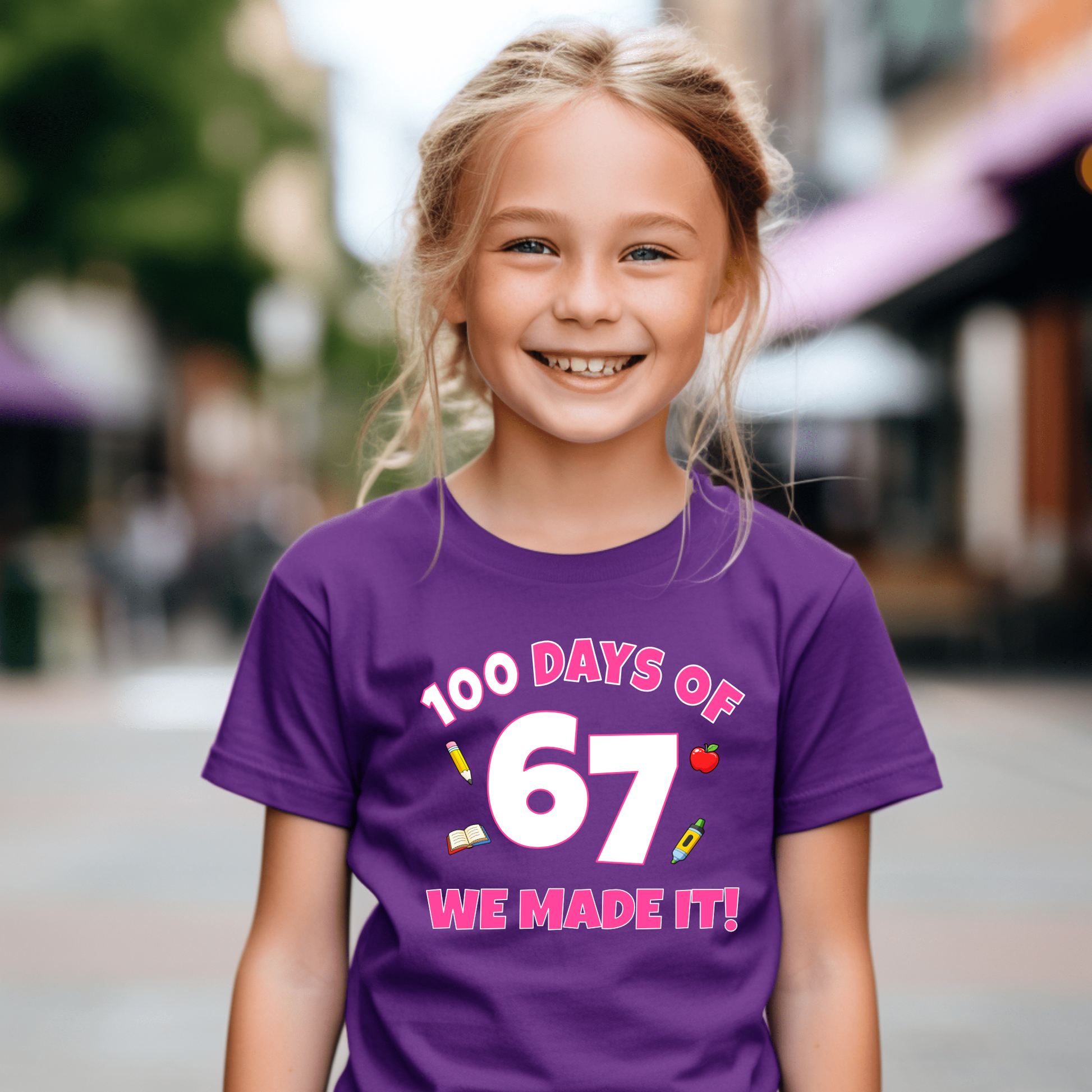 Child wearing a purple t-shirt celebrating 100 days of school with a blurred outdoor background