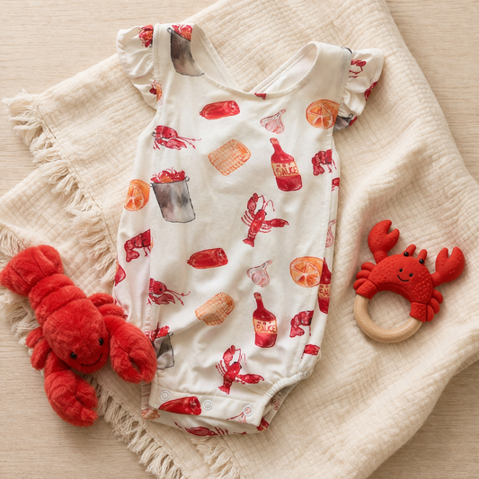 crawfish bamboo baby bubble with ruffle sleeves flat lay