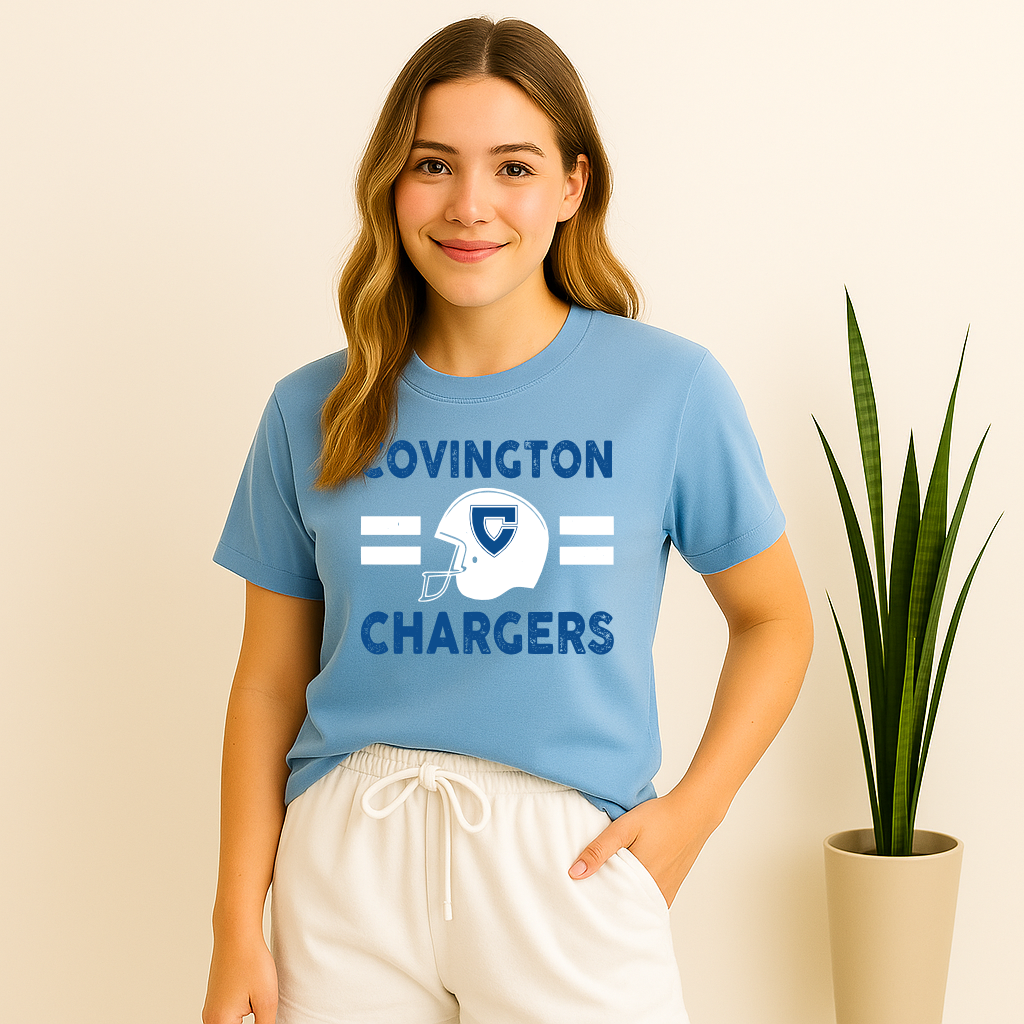 Female wearing a football helmet shirt with Covington Chargers on Carolina Blue
