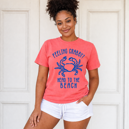 Feeling Crabby beach T-shirt with blue crab graphic on coral shirt
