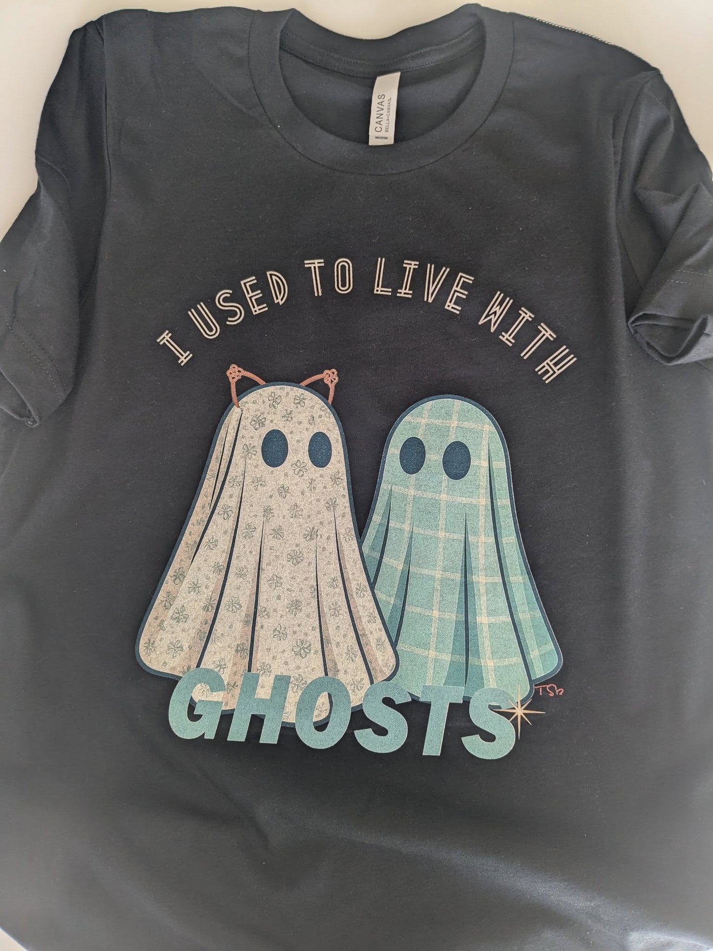 I used to live with ghost black flat lay tee