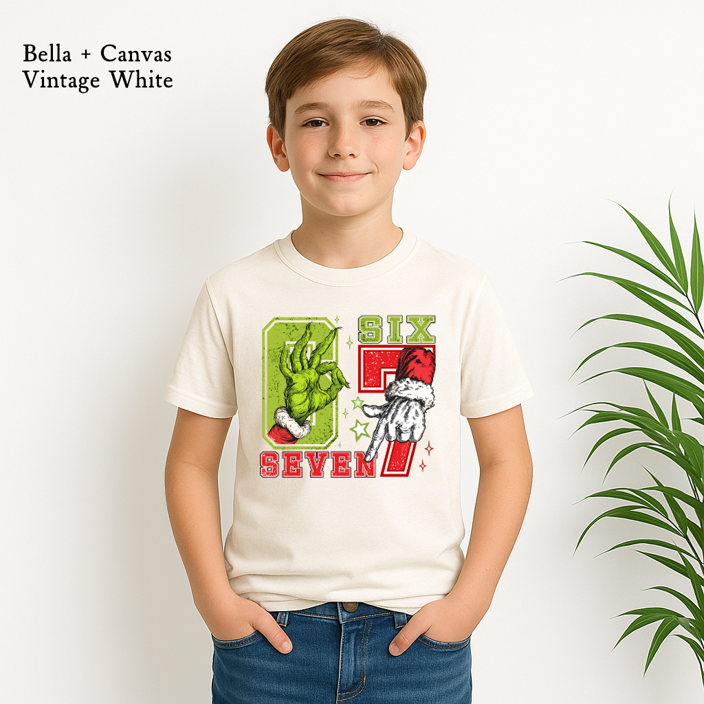Grinch hand and Santa glove Christmas humor graphic tee
