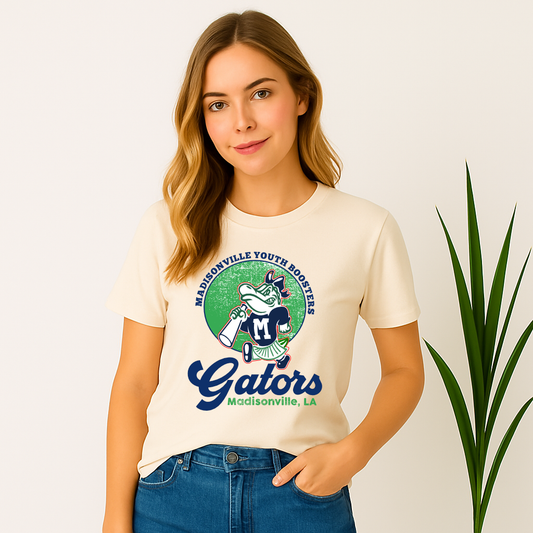 Woman wearing a Madisonville Youth Boosters Gators shirt with a vintage circle mascot design

