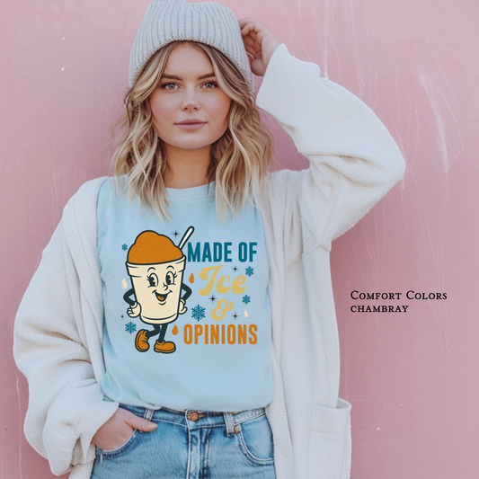 Woman wearing 'Made of Ice & Opinions' snoball graphic tee in Comfort Colors Chambray

