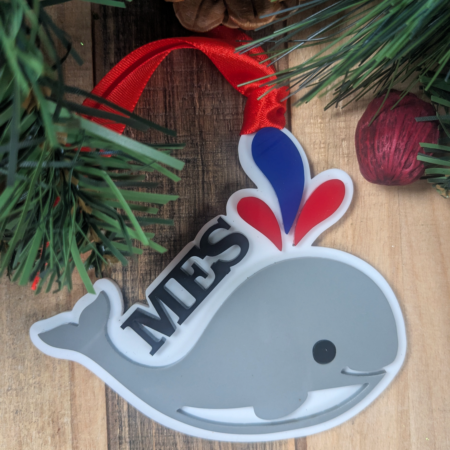 Whale school mascot Christmas ornament in red white and blue