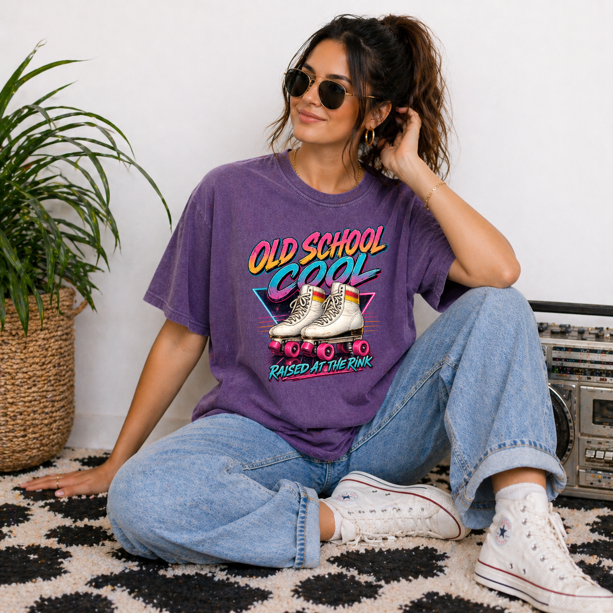 vintage 80s roller skating rink shirt with neon graphic design on purple t-shirt