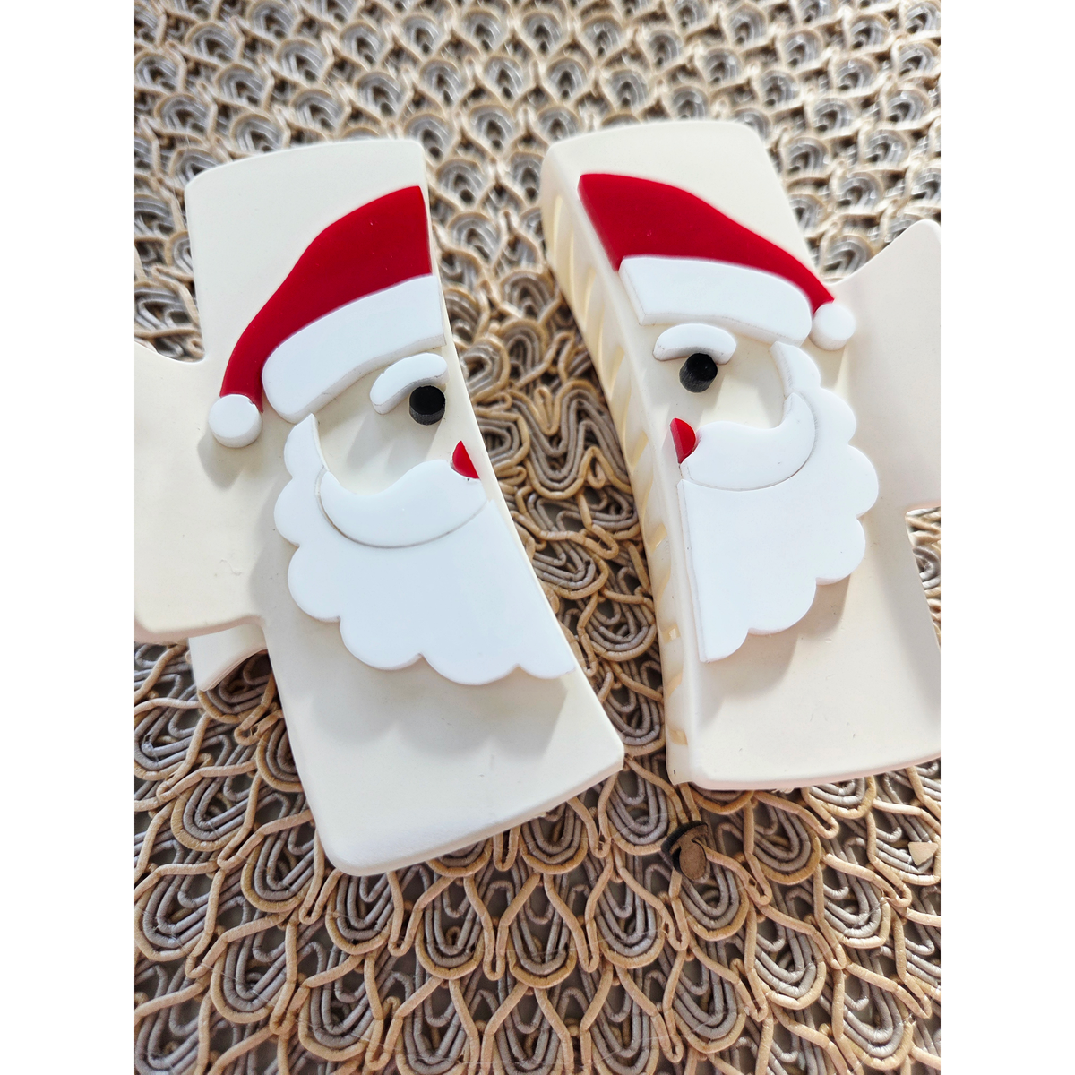 Image Alt Text:
Handmade Santa Claus acrylic claw clip with red hat, white beard, red nose, and black eye details