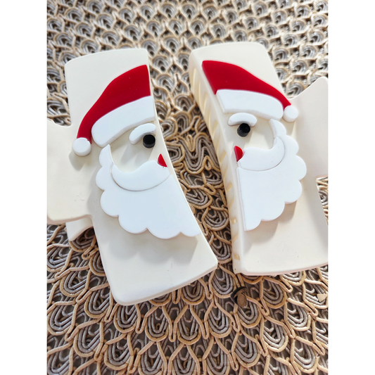 Image Alt Text:
Handmade Santa Claus acrylic claw clip with red hat, white beard, red nose, and black eye details