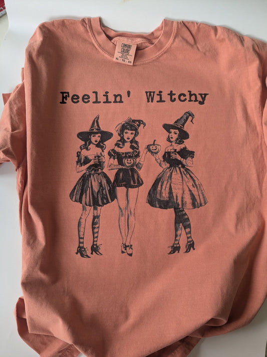 Spooky season Feelin’ Witchy graphic tee flat lay
