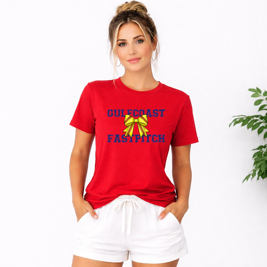 Woman wearing a red t-shirt with 'Gulf Coast Fastpitch' text and graphics on a white background