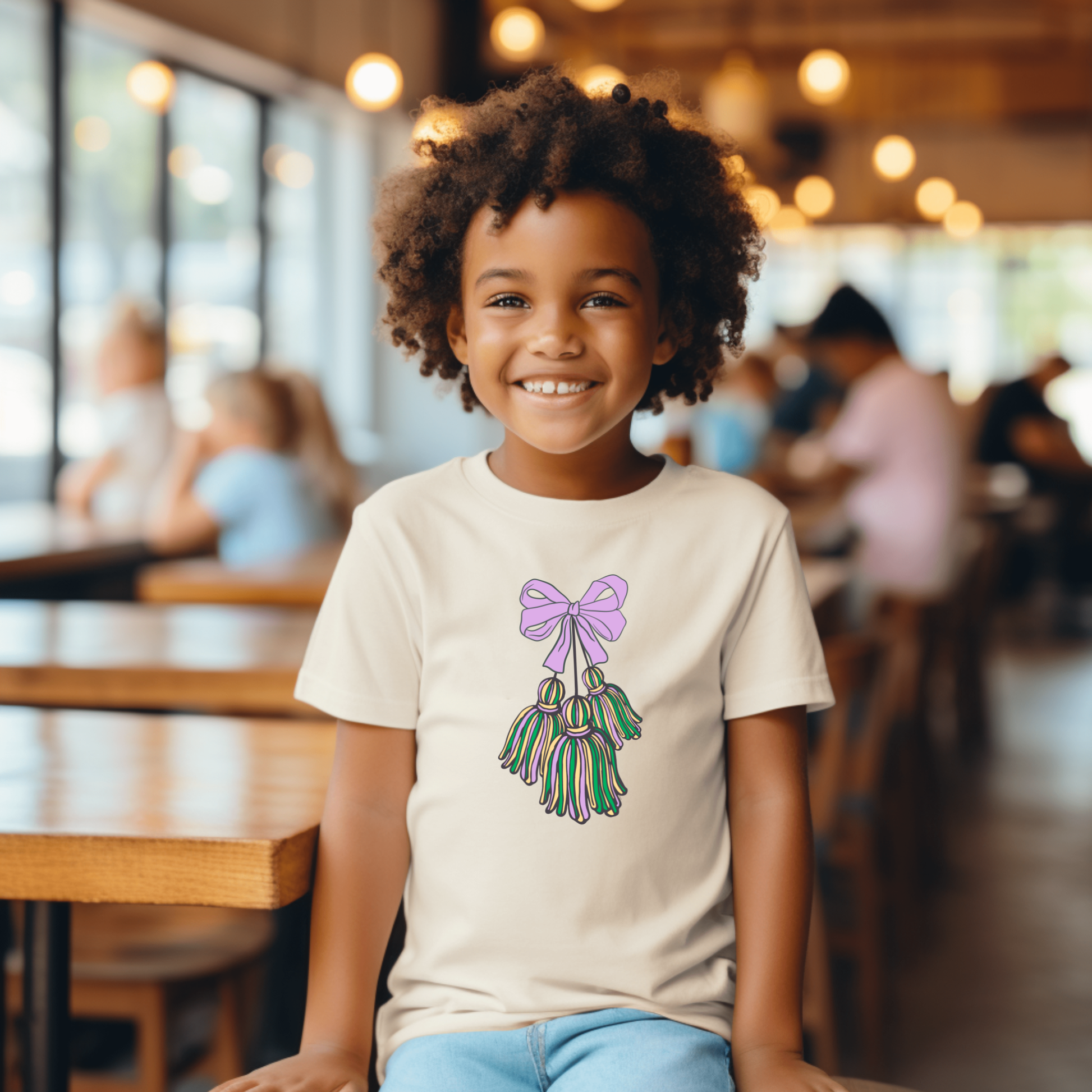 Kids Mardi Gras parade shirt with marching tassels and coquette bow